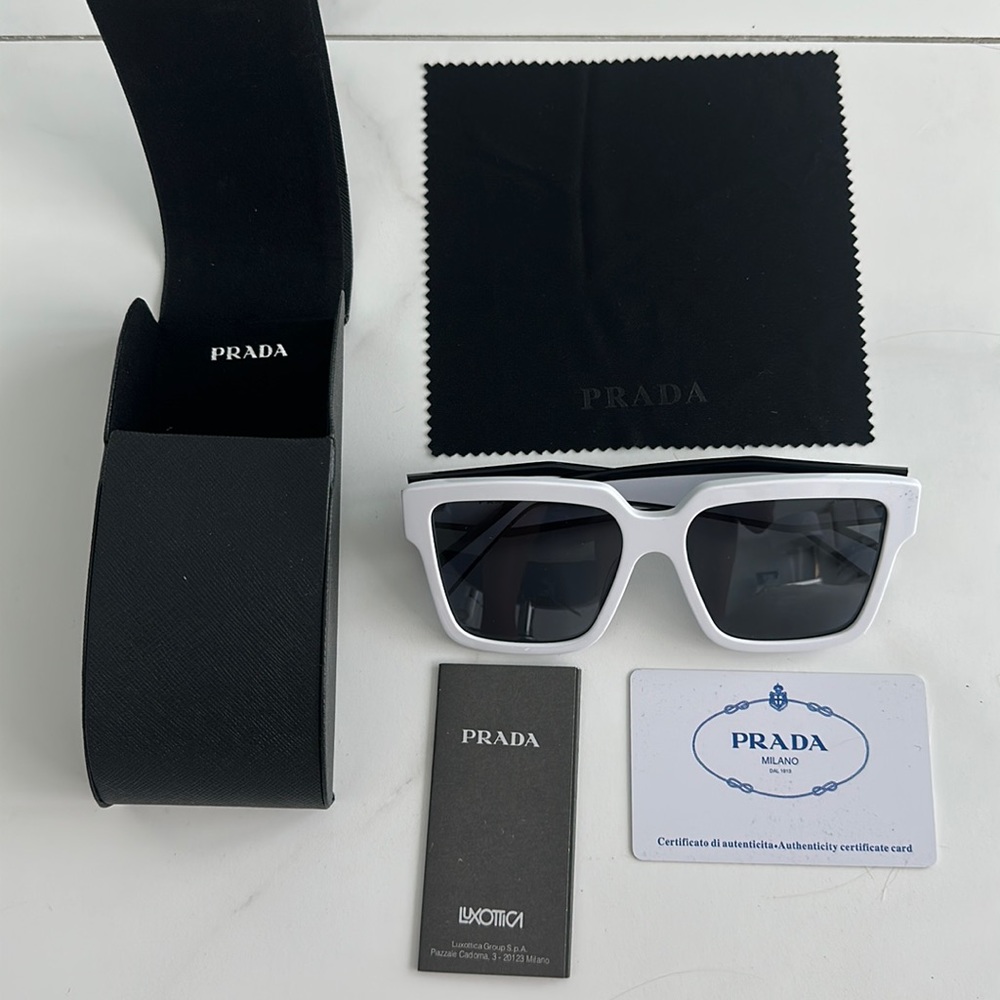 Prada white and black women’s sunglasses authenticity guaranteed